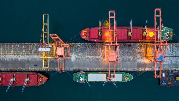 istock Aerial view bulk carrier dock, Global business import export logistic and transportation company, Commercial dock container cargo vessel freight shipping worldwide. 1401439419