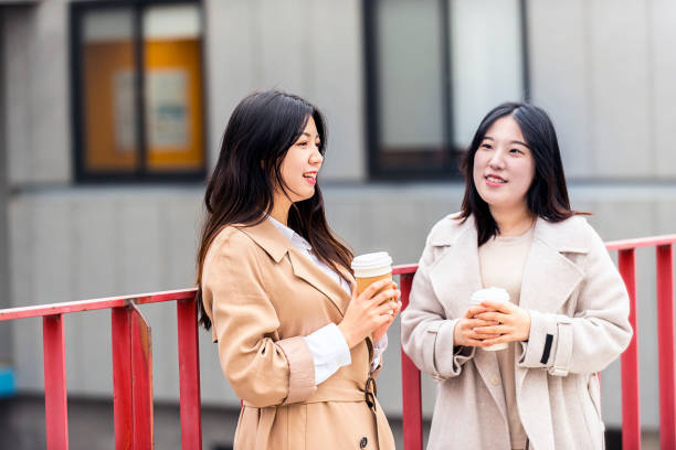 istock Fall campus lifestyle of female college students 1401448028