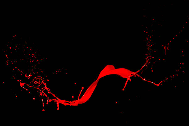 isolated red paint against black backgrounds
