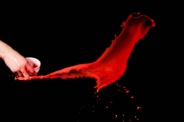 isolated red paint against black backgrounds
