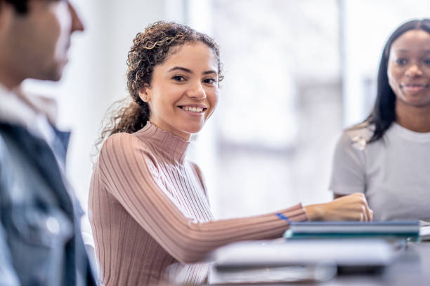 istock Female University Student Studying with Peers 1401455337