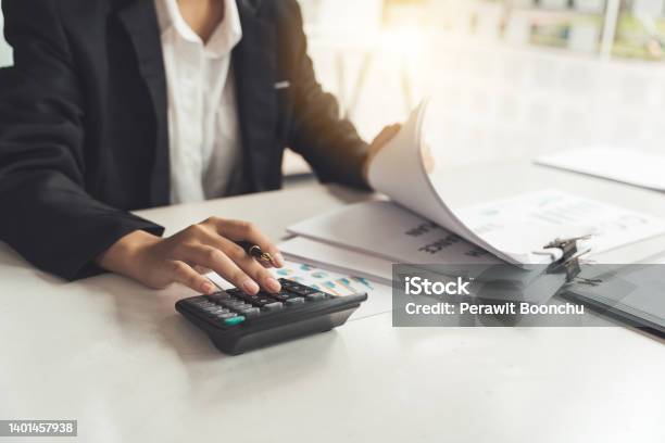 Business Woman Accountant Or Banker Making Calculations Savingsbusiness Financing Accounting Banking And Economy Concept Stock Photo - Download Image Now