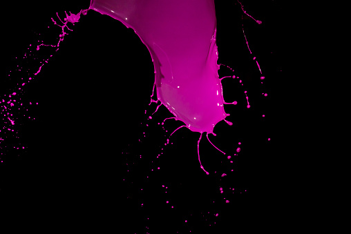 isolated pink paint against black backgrounds