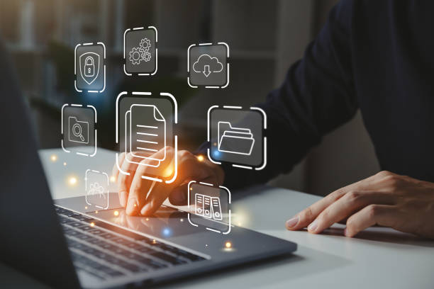 Businessman working on laptop with document management icon. Businessman working on laptop with document management icon, Online document file management, database technology concept. organization stock pictures, royalty-free photos & images