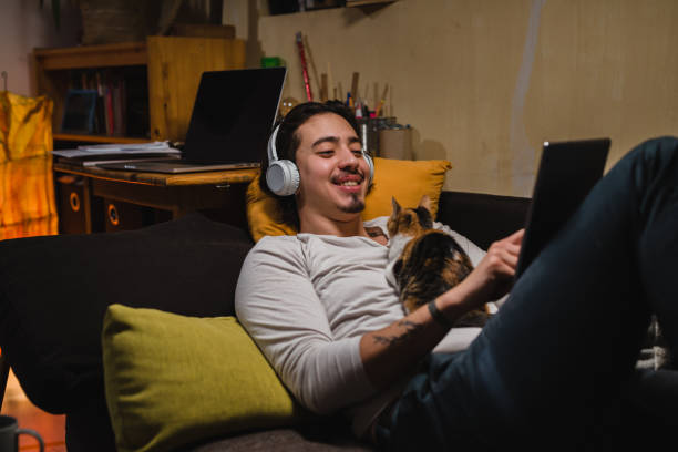 istock young caucasian man relaxing in his room 1401466922
