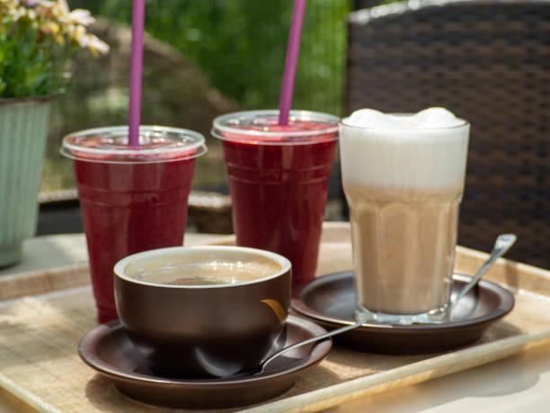 istock Coffee, cappuccino and smoothies on a table in a cafe. 1401468201