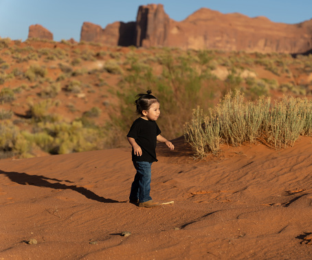 Navajo indigenous Small kid in Monument Valley, USA