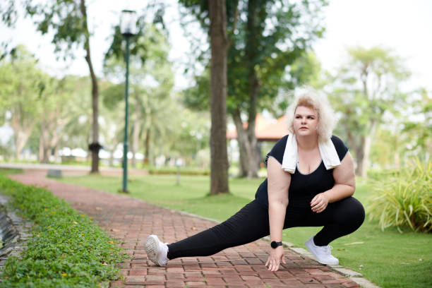 istock Woman Stretching Outdoors 1401471980