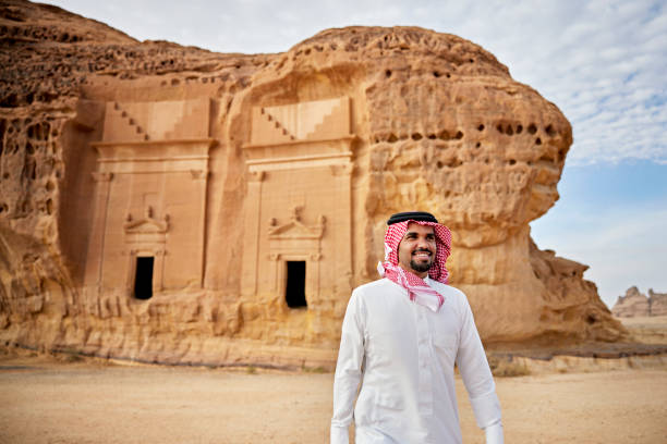 istock Cheerful young man visiting Hegra in Al-Ula, Saudi Arabia 1401473302
