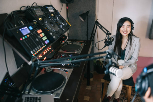 istock Woman interviewing man in a radio show 1401474052