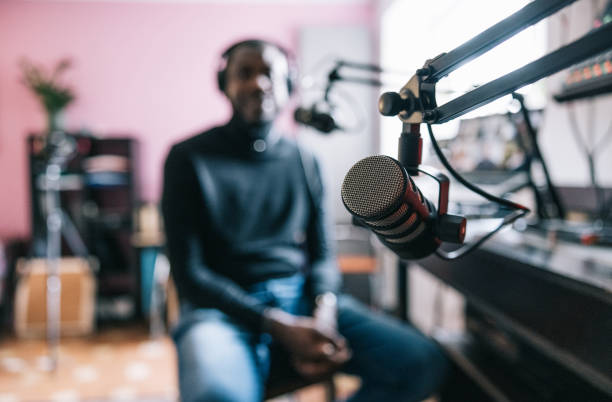 istock Radio station microphone in recording studio 1401474062