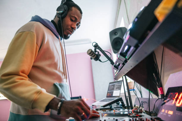 istock DJ mixing a online music set for his listeners 1401474070