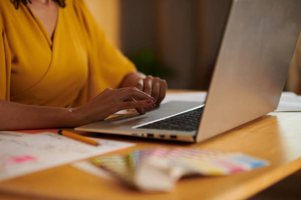 istock Fashion Designer Working on Laptop 1401476368