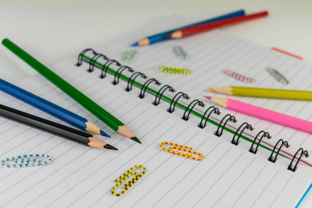 View of note pads with school and office accessories