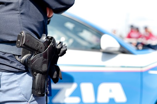 Padua, Italy - April 12, 2022. Police patrol car and Policeman in Padua during security activity.
