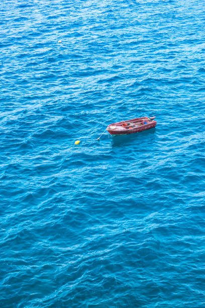 istock Small boat on sea water 1401479666