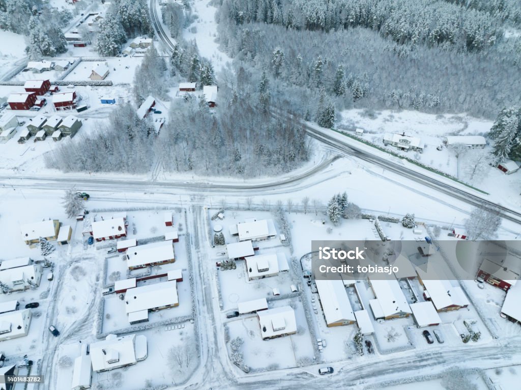 Residential villa area in the winter seen from above Villas in the the village of Skare seen from above in the cold snowy winter landscape. Skare is a small but luxurious villa area outside the city of Karlstad in Varmland, Sweden. Above Stock Photo
