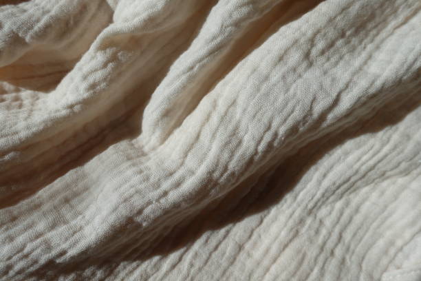 istock Rippled simple thin white cotton muslin fabric 1401483870