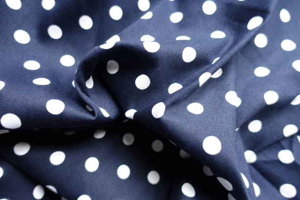 istock Draped dark blue and white cotton fabric with polka dot pattern 1401484147