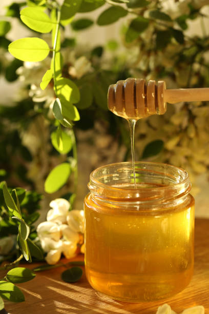 istock Jar of honey with blossom 1401486042