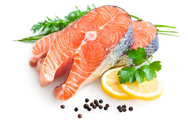 A Fresh salmon fillet with a side of lemon
