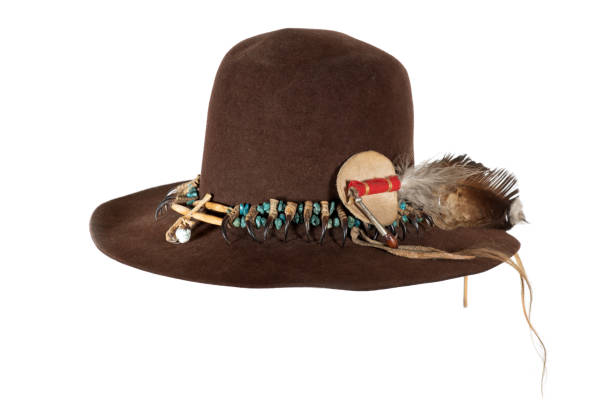 istock Native American hat with hat band made of raptor claws and turquoise on brown felt with eagle feather 1401486869