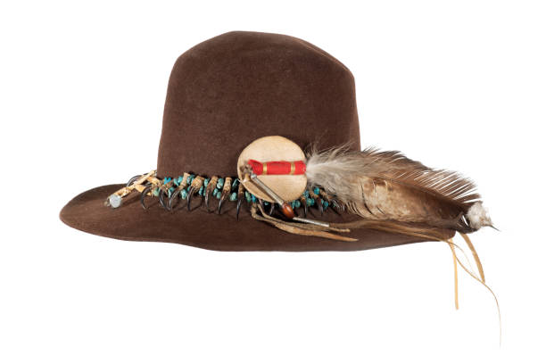 istock Native American hat with hat band made of raptor claws and turquoise on brown felt with eagle feather 1401487106