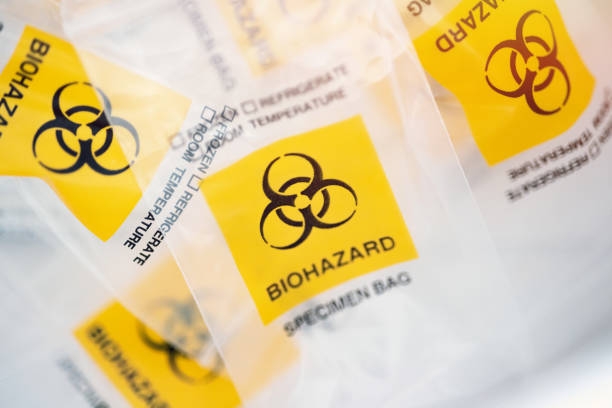 istock plastic zip bag with a yellow triangle biohazard logo 1401488948