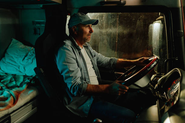 Truck driver driving long distance at night