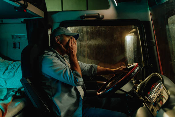 istock Truck driver feeling tired in nightshift 1401493563