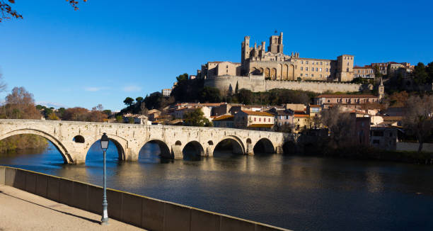 istock Old Bridge over Orb river and medieval cathedral, Beziers 1401494136
