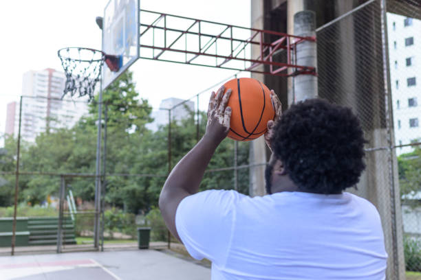 istock A man with vitiligo playing basketball 1401495880