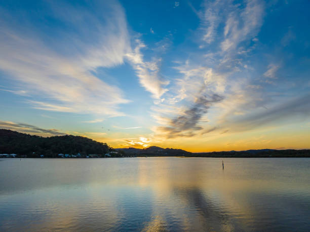 istock High cloud sunrise at the waterfront 1401495911