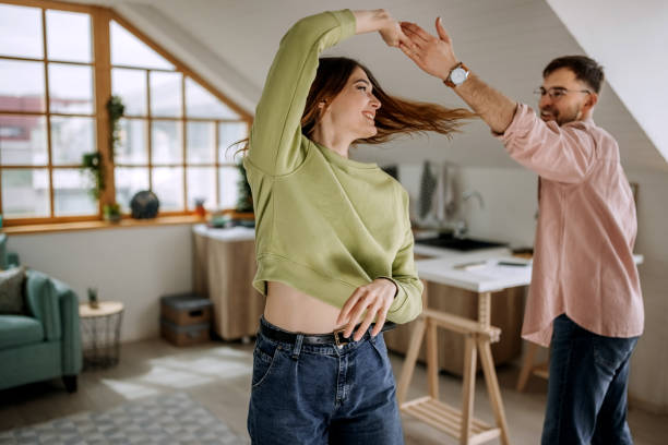 istock Couple dancing in their apartment 1401496583