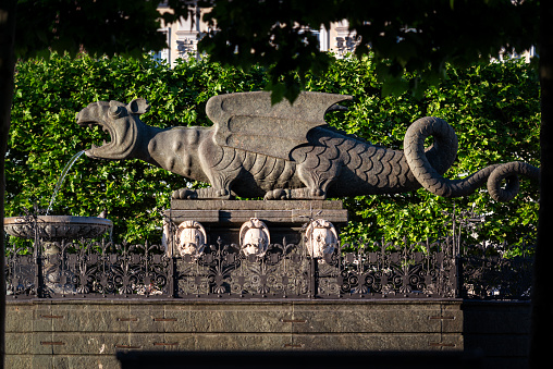 Victoria Embankment, London, England - October 25th 2023: One of the famous cast iron statues of a dragon marking the boundary of London - this is one of the originals from 1849