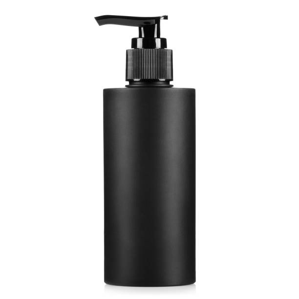 istock Black plastic bottle with dispenser on white 1401500181