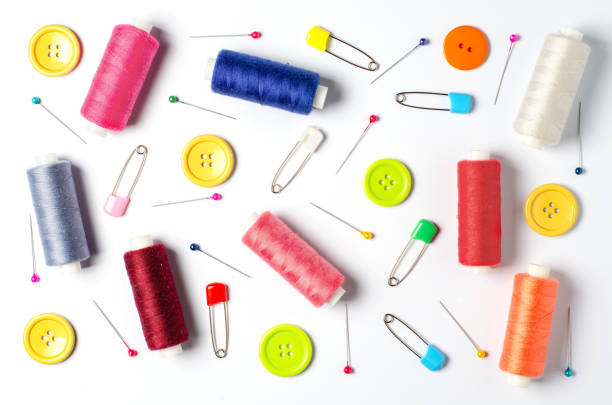 istock Accessories for sewing on a white background. Closeup. 1401507091