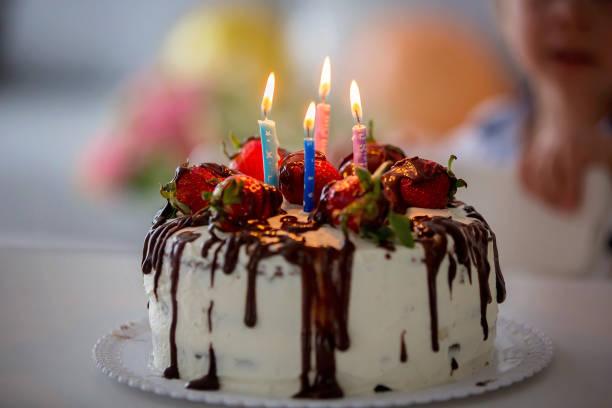 istock Birthday cake with strawberries and chocolate 1401507377