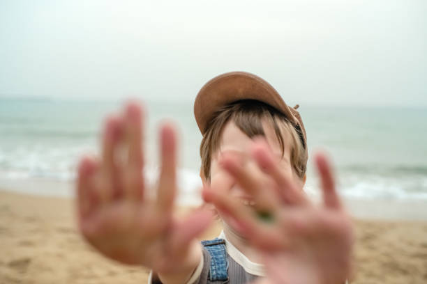 Child playing near the sea