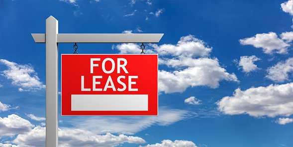 For lease sign on blue cloudy sky background. Real estate business, building offer for rent concept. 3d render