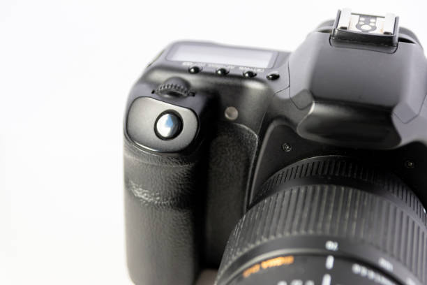 istock Professional dslr camera equipment with 70-300 mm tele zoom objective with wide camera lens in macro close-up view shows details of photographic equipment for studio shots and portrait wildlife photos 1401521103