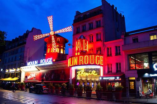 PARIS, FRANCE - 17 MAY, 2017: \nThe Moulin Rouge by night.