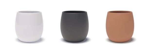 istock 3D realistic glossy white, black and terracotta ceramic flower pots with drop shadows. Three-dimensional empty reservoirs for house plants. Vector isolated clipart 1401521519
