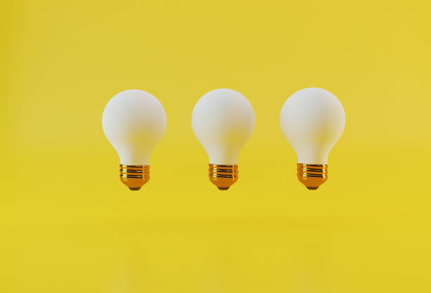 istock Set of bulbs on a yellow background.Concept for creative idea. Light sources, flood light .3d render image . 1401527431