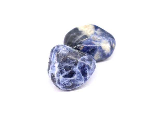 istock Sodalite gemstones, on white background. 1401534551