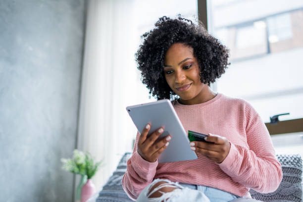 istock Black woman shopping online 1401536629