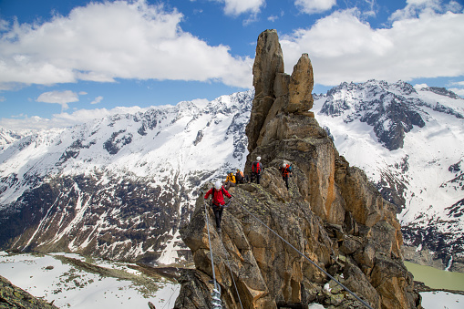 Goscheneralp, Switzerland - May 24, 2014: A Group of a climber on a Via Ferrata in Switzerland