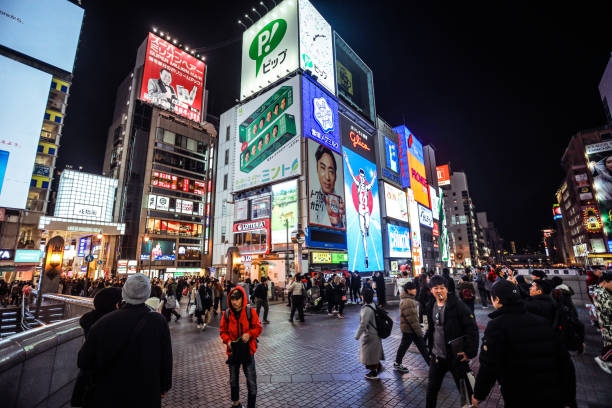 Osaka, Japan - January 11, 2020: Crowded Illuminated Dotombori Street in Night Osaka
