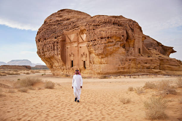 istock Local Saudi man visiting rock-cut architecture at Hegra 1401540825