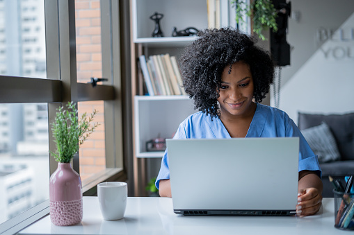 https://media.istockphoto.com/id/1401542006/photo/nurse-in-consultation-by-video-call.jpg?b=1&s=170667a&w=0&k=20&c=OeN_L054VsXbXcFpvmUhpi2PsfzK6DujuX1pM_7Gfj4=